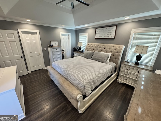 bedroom with ceiling fan, dark hardwood / wood-style flooring, and crown molding