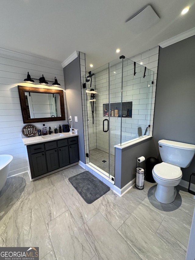 bathroom featuring vanity, a shower with door, ornamental molding, and wood walls