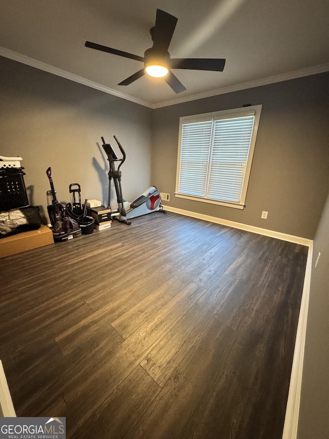 exercise room with ceiling fan, hardwood / wood-style floors, and ornamental molding