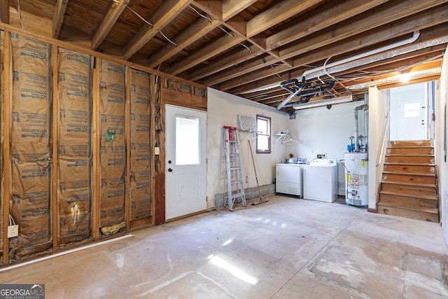 basement with washing machine and dryer and gas water heater