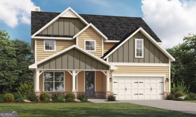 view of front facade featuring a front lawn and a garage