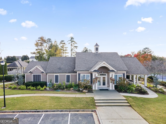 view of front of house with a front lawn