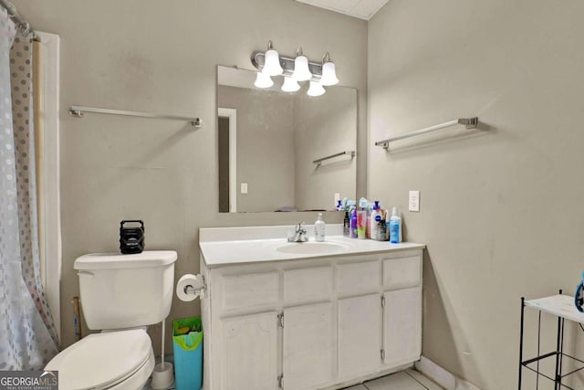 bathroom featuring tile patterned floors, vanity, toilet, and curtained shower