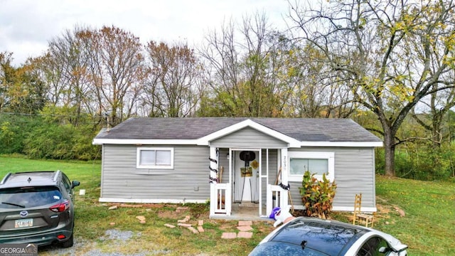 view of front of home with a front yard