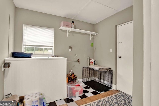 laundry area featuring hardwood / wood-style floors