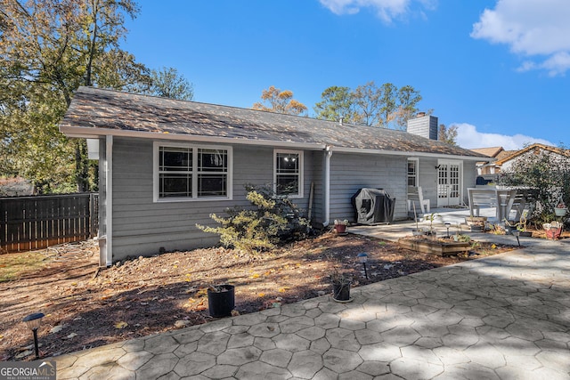 view of front of property featuring a patio