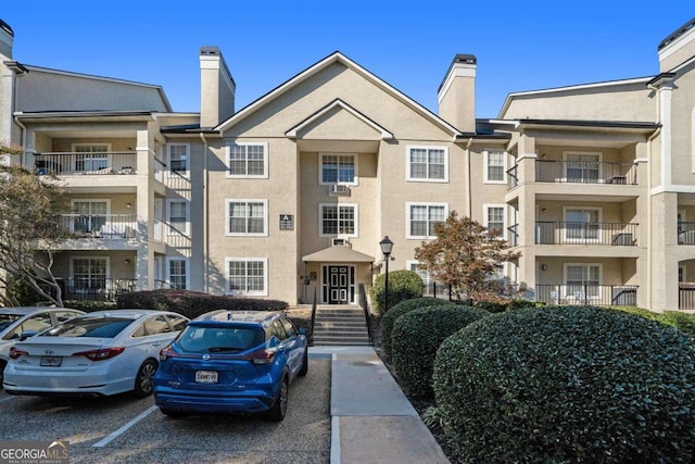 3655 Habersham Rd NE Unit 226-A, Atlanta, GA 30305 - view of property with uncovered parking