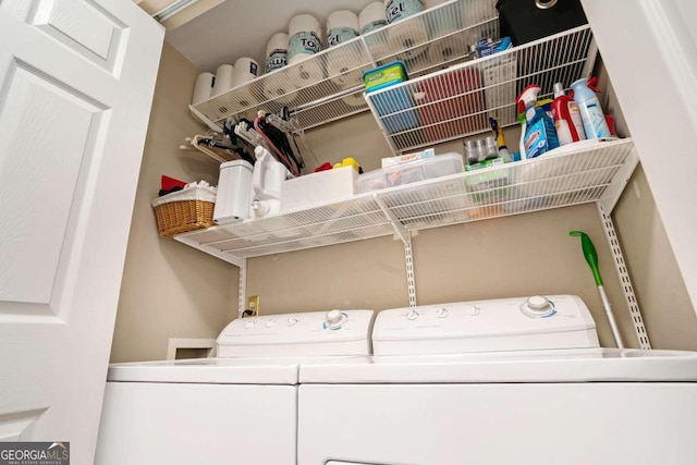 laundry area featuring washing machine and dryer