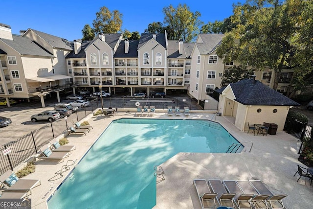 view of swimming pool with a patio