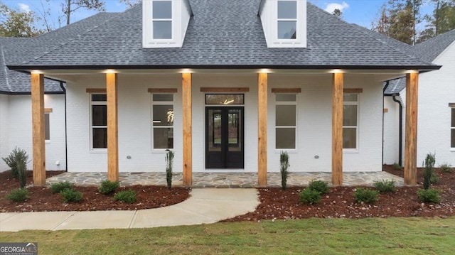 property entrance with a porch