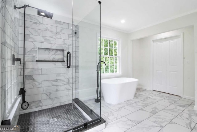 bathroom featuring plus walk in shower and ornamental molding