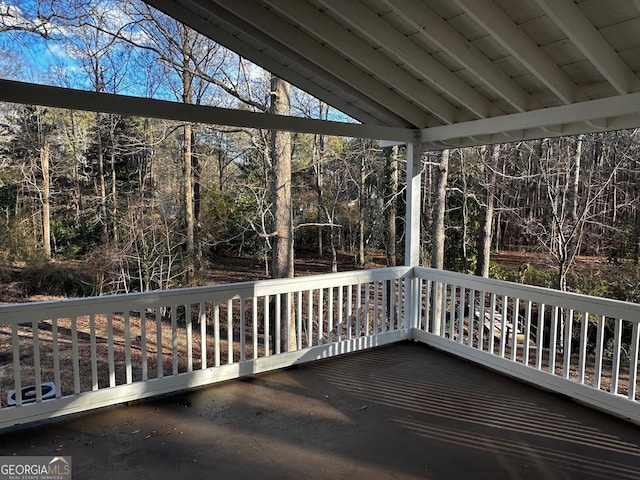 exterior space featuring a view of trees