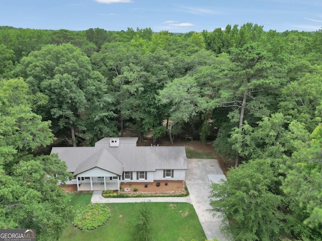 bird's eye view featuring a view of trees