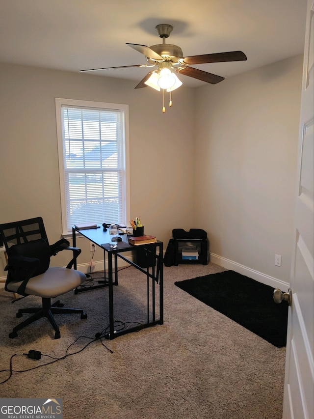 office area featuring carpet flooring and ceiling fan