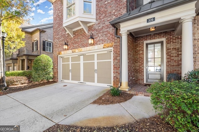 entrance to property featuring a garage