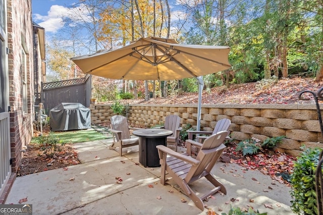 view of patio with a grill