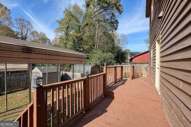 wooden deck with a storage unit