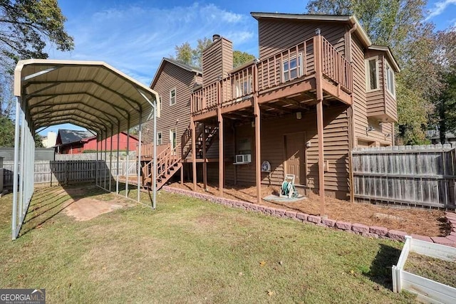 rear view of house featuring a carport, cooling unit, a deck, and a yard