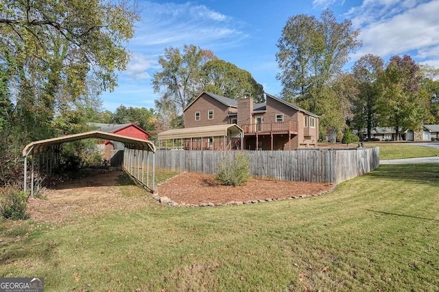 view of yard with a carport