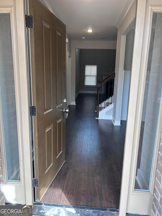 hall featuring dark hardwood / wood-style floors