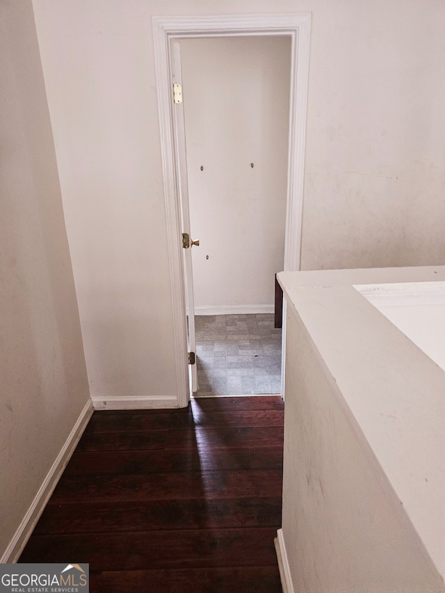 hall featuring dark hardwood / wood-style floors