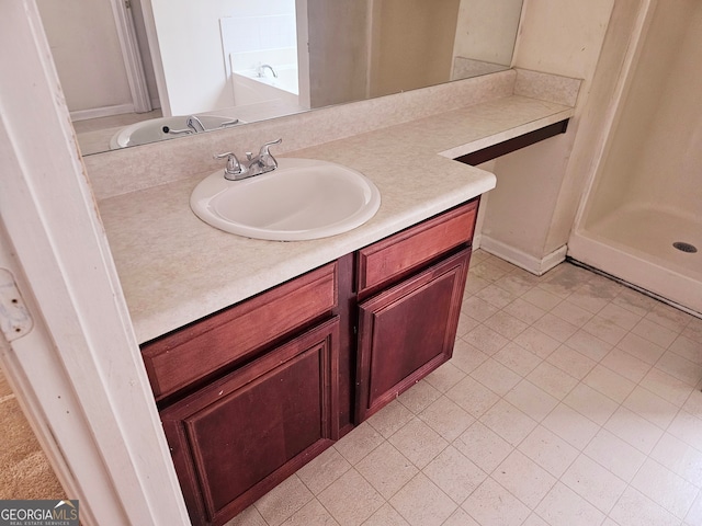 bathroom featuring vanity and walk in shower