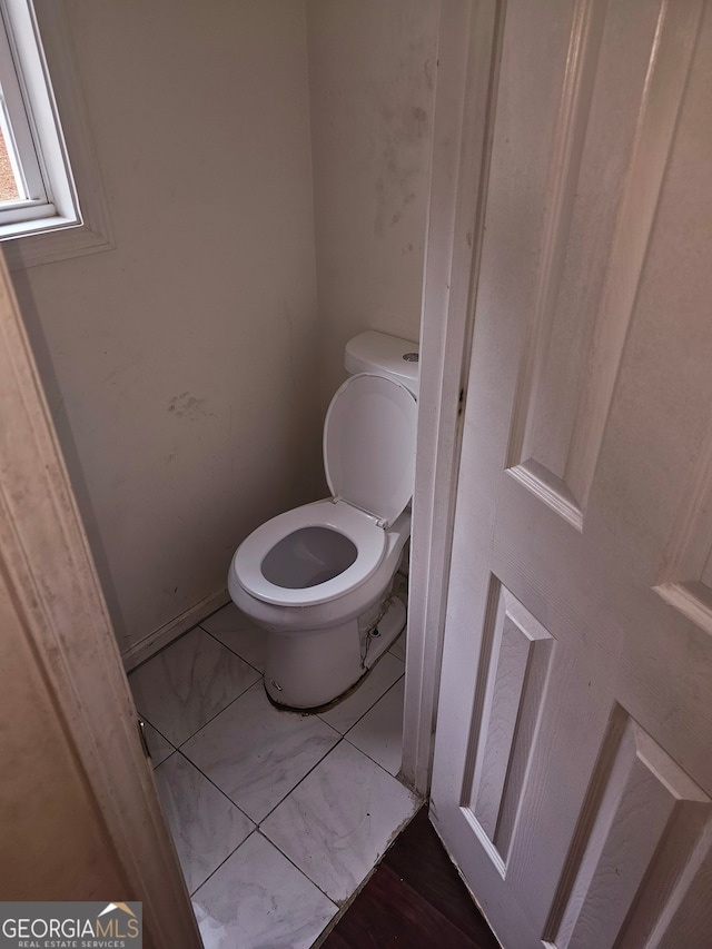 bathroom featuring toilet