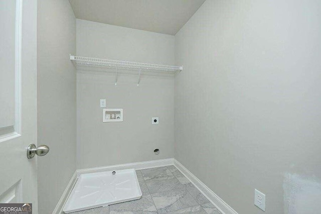 laundry area with laundry area, hookup for an electric dryer, marble finish floor, washer hookup, and baseboards