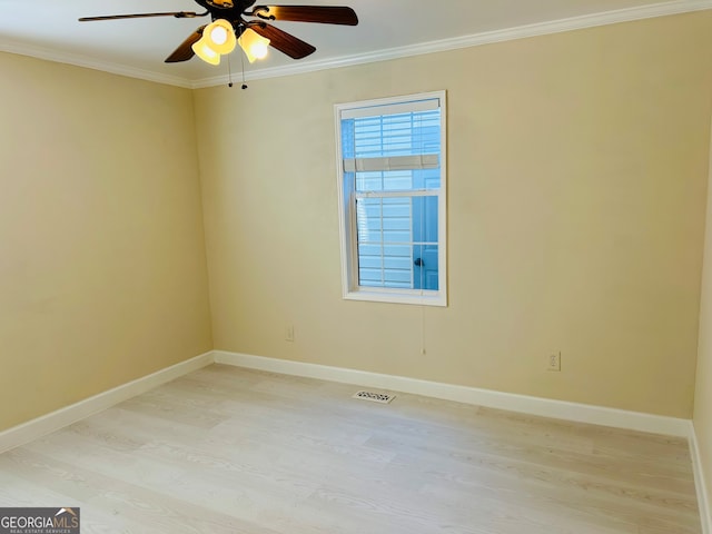 unfurnished room with light wood-type flooring, ceiling fan, and ornamental molding