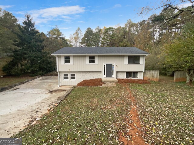 raised ranch featuring a garage