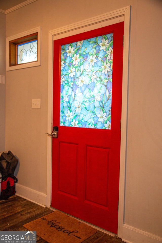 doorway with dark hardwood / wood-style floors