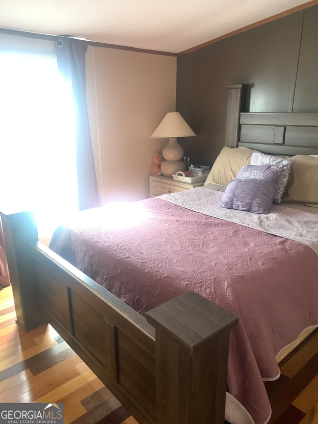 bedroom featuring light hardwood / wood-style floors