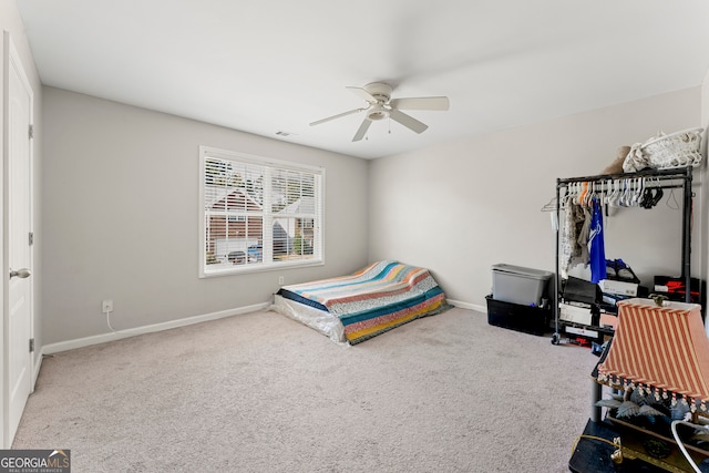 bedroom featuring carpet and ceiling fan