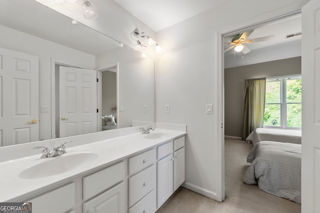 bathroom featuring ceiling fan and vanity