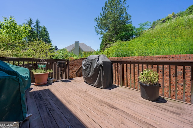 wooden deck with area for grilling