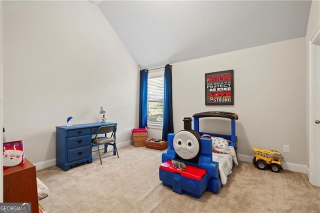 carpeted bedroom with lofted ceiling