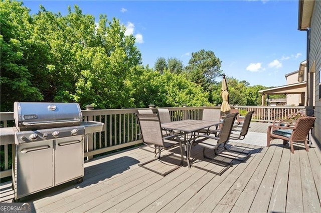 wooden terrace with grilling area