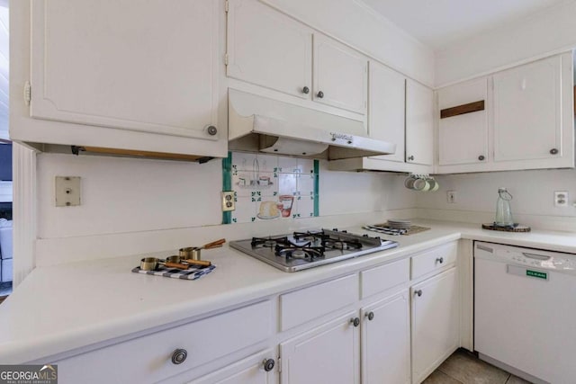 kitchen with white cabinets, dishwasher, light tile patterned floors, and stainless steel gas cooktop