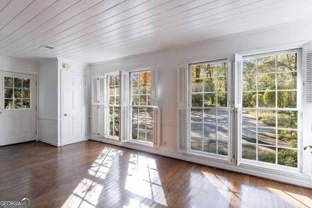 entryway featuring crown molding, wooden ceiling, and dark wood-type flooring