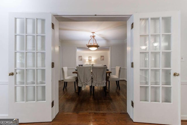 dining space with dark hardwood / wood-style floors