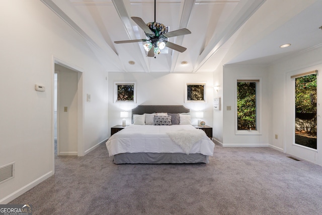 carpeted bedroom featuring access to exterior, ceiling fan, lofted ceiling with beams, and ornamental molding