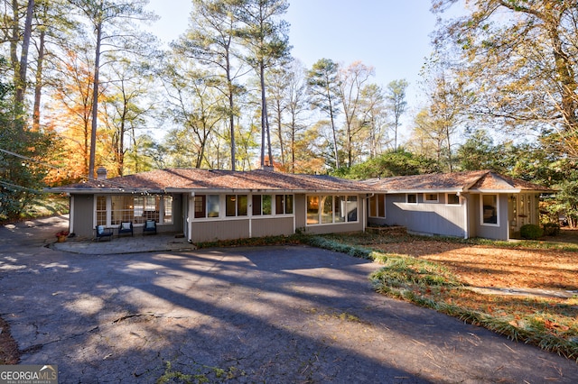 single story home with a patio