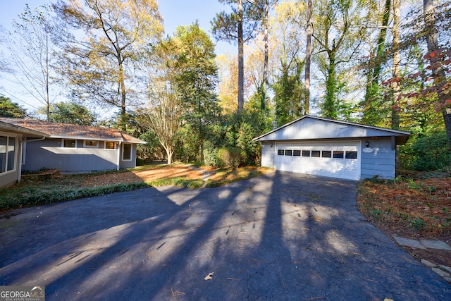 exterior space with a garage