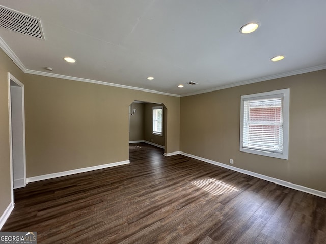 1764 Thomas Ter, Decatur, GA 30032 - empty room with arched walkways, baseboards, dark wood-type flooring, recessed lighting, and ornamental molding