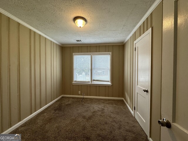 1764 Thomas Ter, Decatur, GA 30032 - empty room with carpet floors, ornamental molding, a textured ceiling, and baseboards