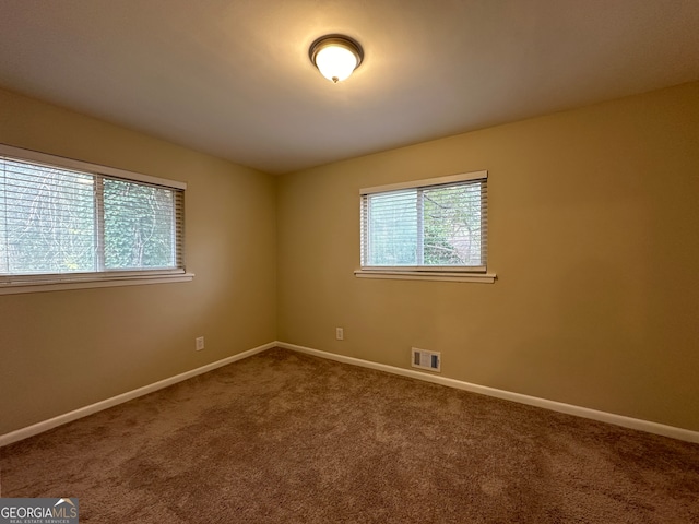 view of carpeted spare room