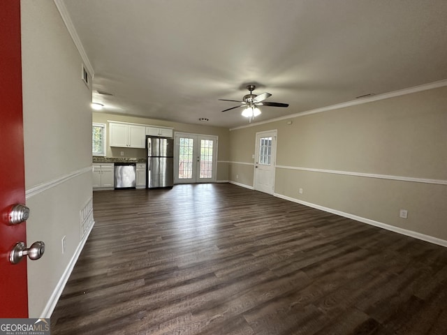 4433 Mercer Rd, Decatur, GA 30035 - unfurnished living room featuring a ceiling fan, baseboards, crown molding, and dark wood-style flooring
