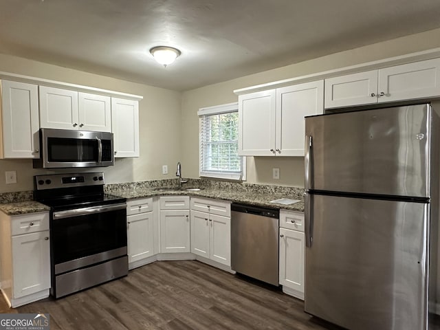 4433 Mercer Rd, Decatur, GA 30035 - kitchen featuring stainless steel appliances, a sink, and white cabinets