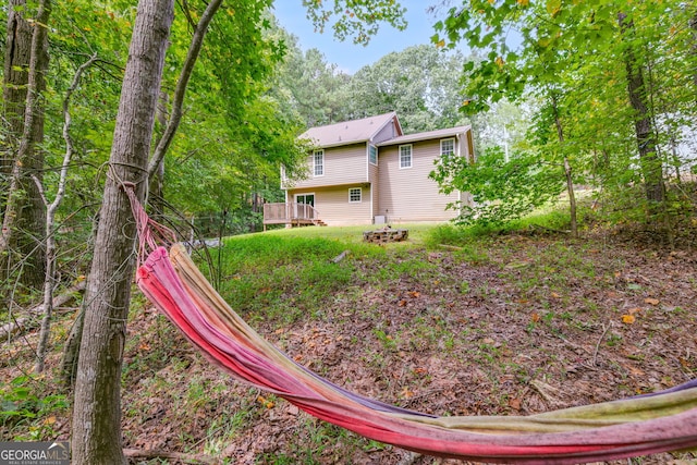 view of yard featuring a wooden deck