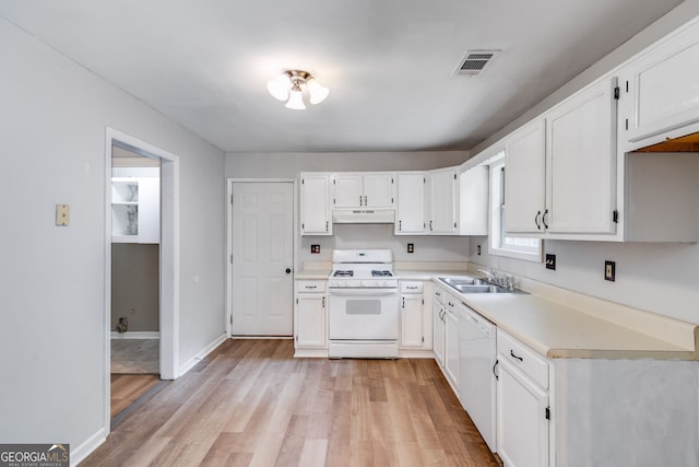 kitchen featuring white cabinetry, white appliances, sink, and light hardwood / wood-style flooring